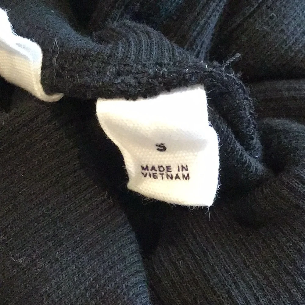 GAP - a long-sleeved, ribbed knit top notable for its puff shoulders.